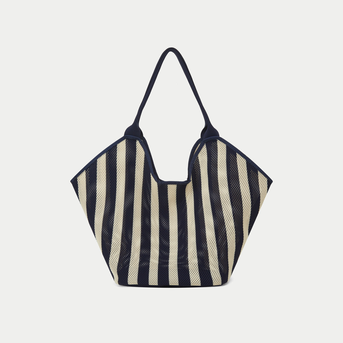 Front view of navy and beige striped mesh knit tote bag with long handles, vertical stripe design, and a soft relaxed silhouette.