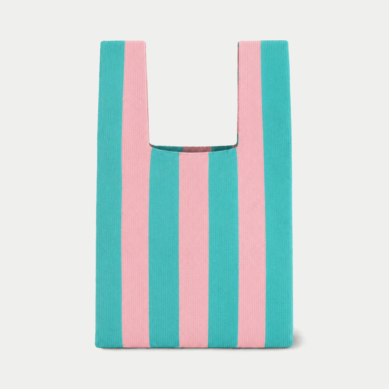 blue and pink vertical stripe knitted tote bag featuring a bold striped design, a lightweight everyday bag made from recycled polyester yarn.