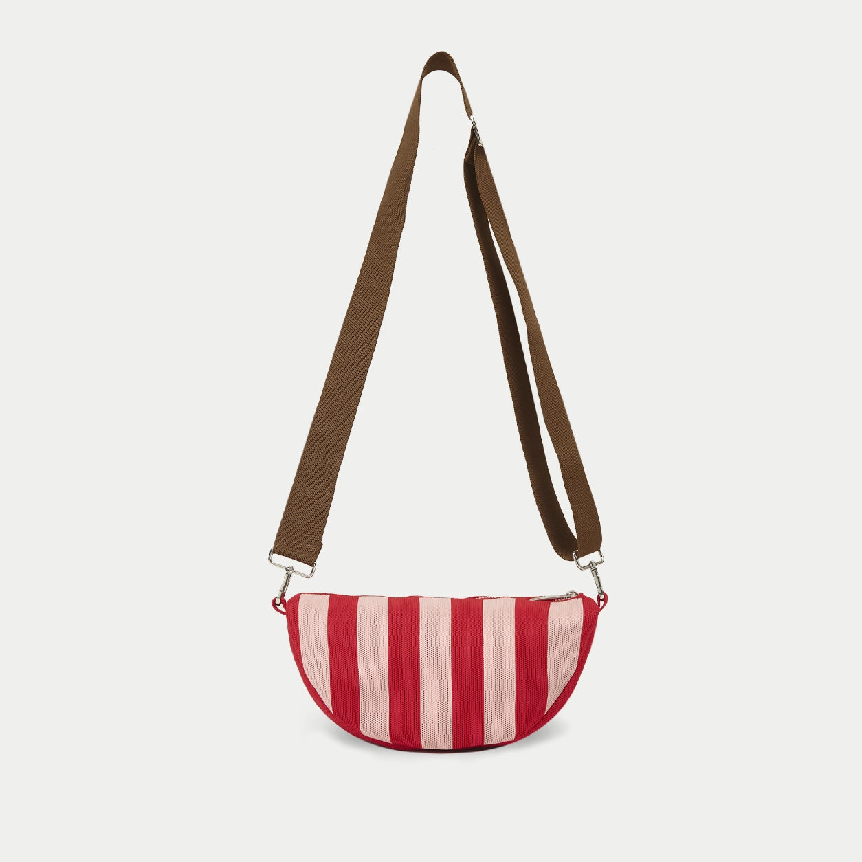 Red vertical stripe knitted half moon crossbody bag featuring a bold striped pattern, lightweight everyday design and adjustable shoulder strap.