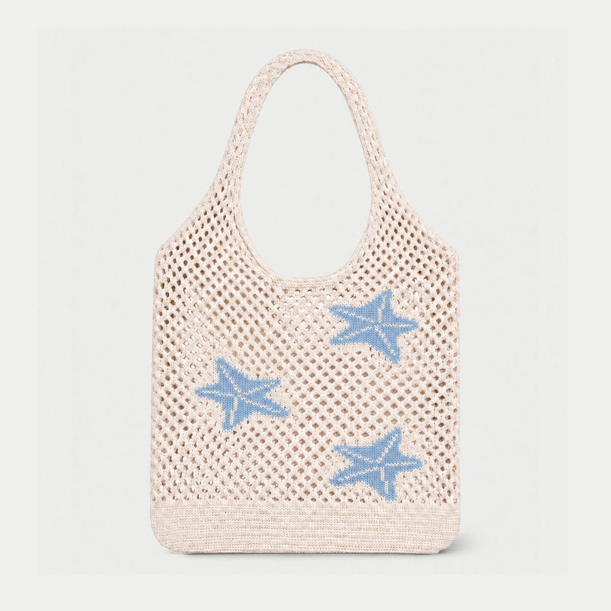 Cream open knit tote bag with light blue starfish motifs, featuring an airy openwork texture and integrated knitted handles by Tokeii.