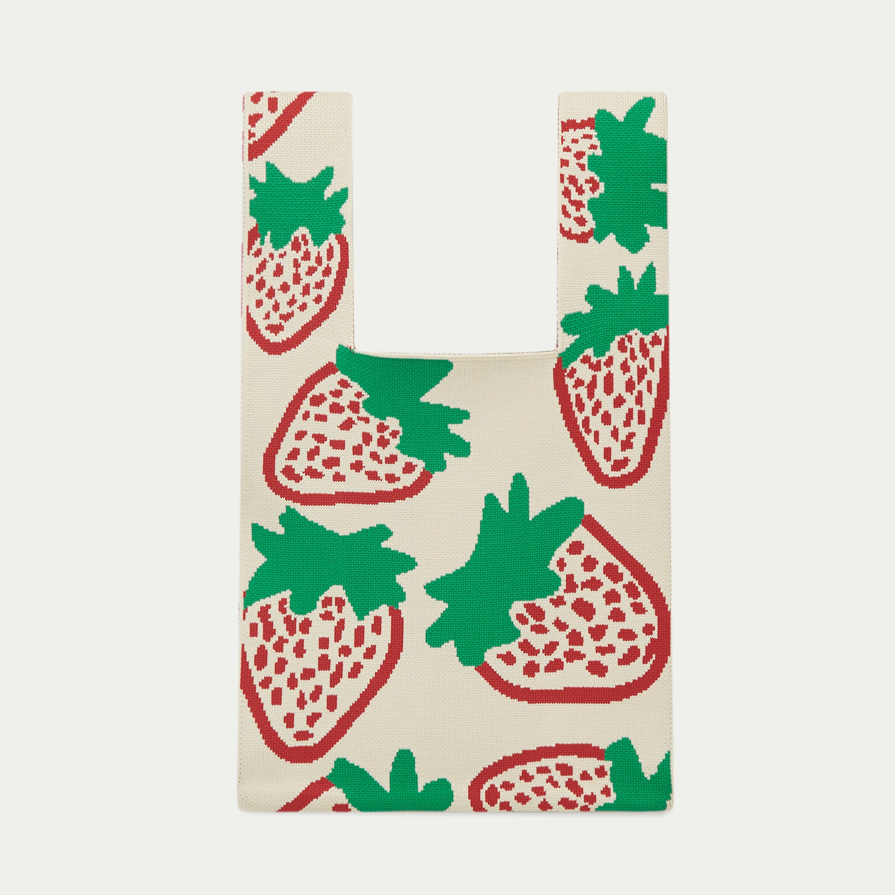 Knitted tote bag made from recycled polyester yarn, featuring red strawberries with green leaves in an all-over pattern by Tokeii.